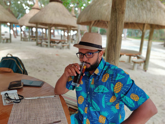 Tusok Best seller Blue Pineapple Shirt on vacation in Mauritius